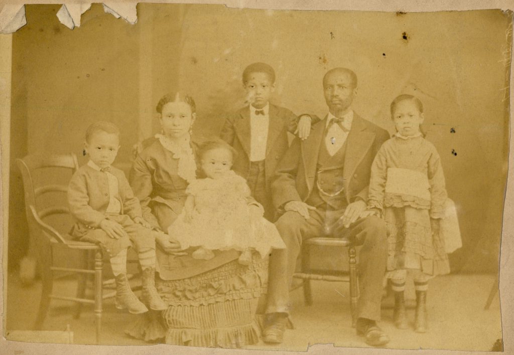 Detail on a family photo emerges—the Hinds family New Philadelphia